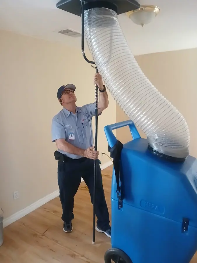 HVAC Installation technician using HEPA equipment in Castle Pines Village